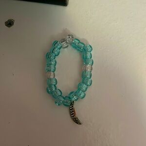 Blue and clear plastic beads with silver gem, crescent moon